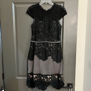 Bariano is an Australian designer. Runs small.